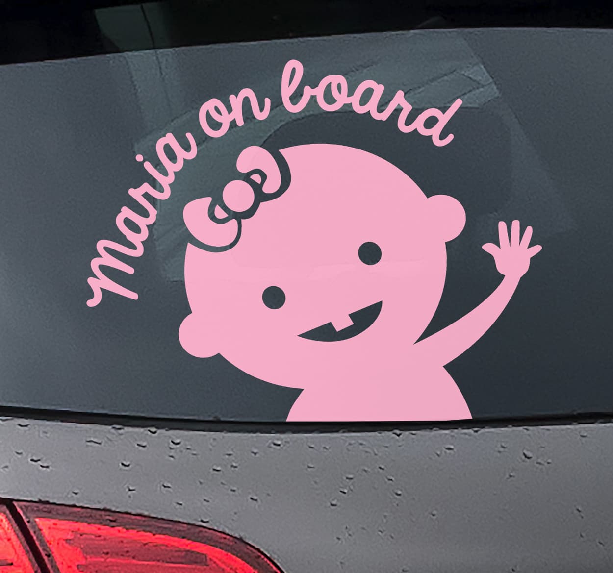 Baby med en rosett baby i bil klistermärke