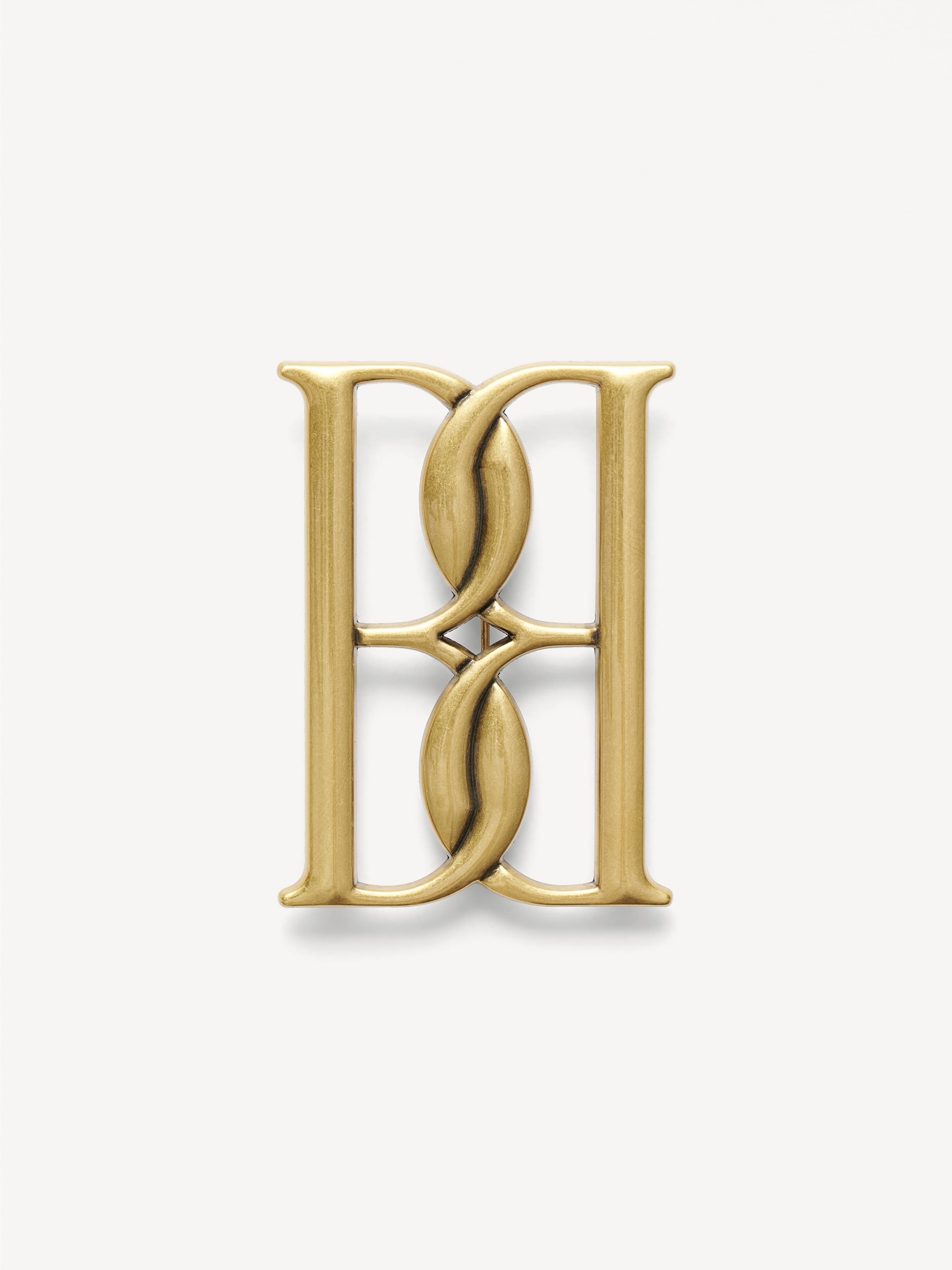 Mono large gold-tone brooch